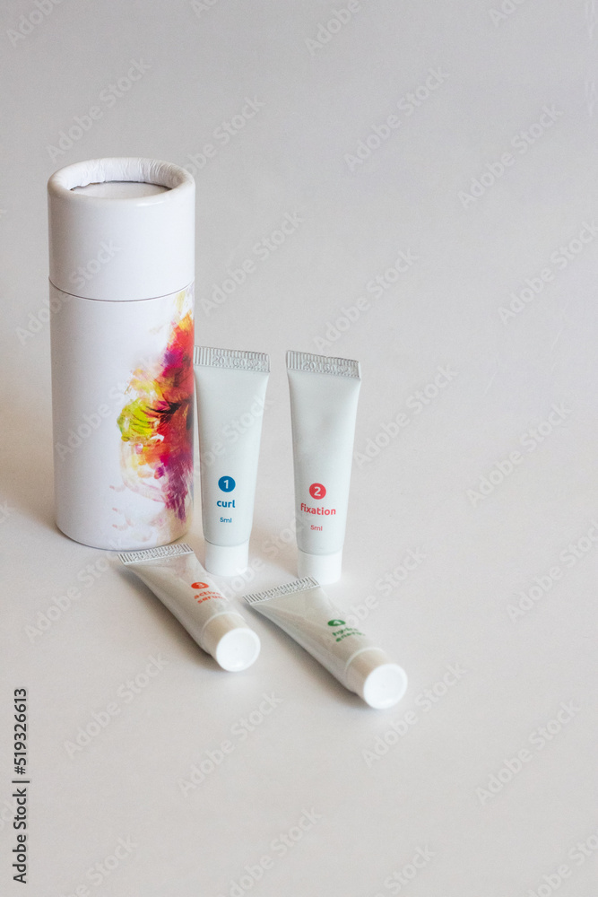 A set for laminating eyelashes and eyebrows in close-up on a white isolated background A set for laminating eyelashes and eyebrows in close-up on a white isolated background