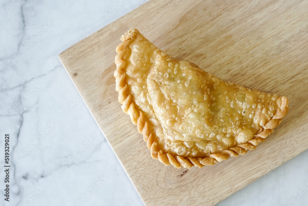 Cornish pasty filled with chicken and potato. Pastry minced pie or