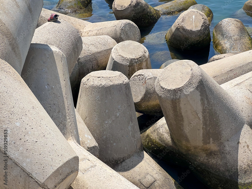 Tetrapod breakwater wall in the mediterranean sea