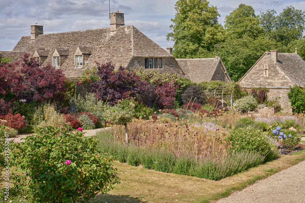Traditional stone cottages and gardens in the Cotswolds, Gloucestershire