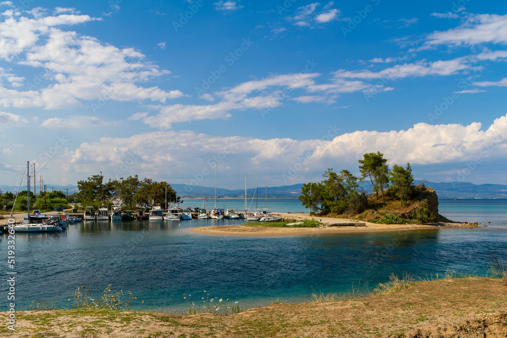 Nea Potidea, Greece, July 10, 2022. Port of the village of Nea Potidea or Nea Poteidea in Kassandra peninsula, Chalkidiki, Greece