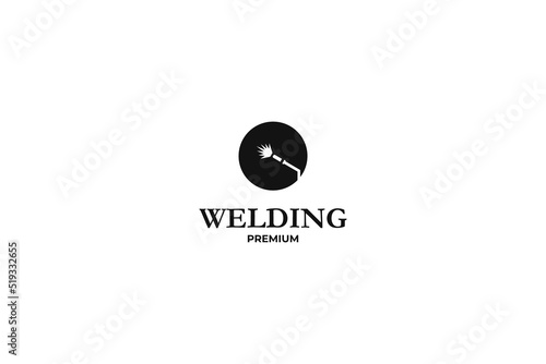 Flat illustration welding torch logo design. Welder tool with spark vector design. Welding work logotype