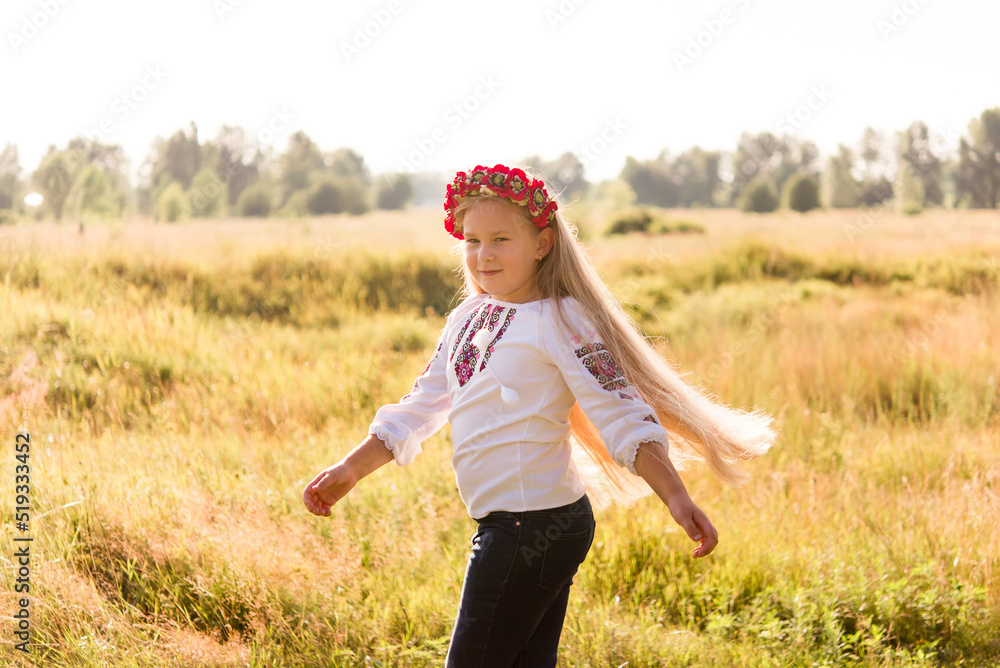 little girl in national Ukrainian clothes - vyshyvanka. Ukraine, child in nature little girl in national Ukrainian clothes - vyshyvanka. Ukraine, child in nature