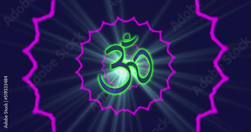 Looped animation of enlightenment with multi-colored energy of chakra aura fields forming divergent patterns of the symbolic lotus and the Indian sign OM. Video for VJing photo