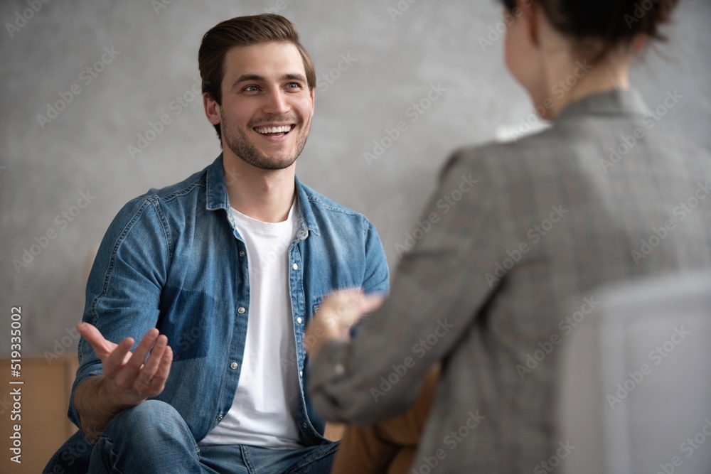 Fototapeta premium Psychologist talking with patient on therapy session.