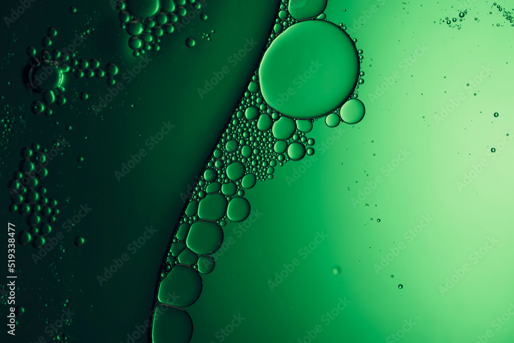 background with bubbles in green liquid - obrazy, fototapety, plakaty 