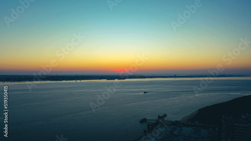 Sunrise over the Tróia peninsula with Setubal in background 
