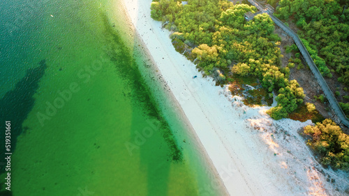 Aerial Bird's eye view of Troia Peninsula on a sunny day, near Lisbon.