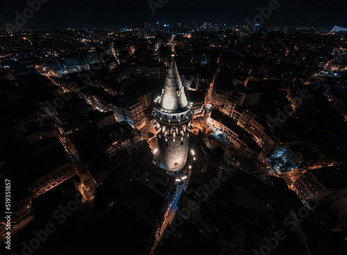 The aerial viewpoint of Galata Tower from a fascinating Istanbul night. photo