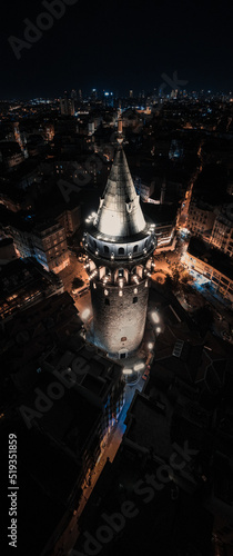 The aerial viewpoint of Galata Tower from a fascinating Istanbul night. photo