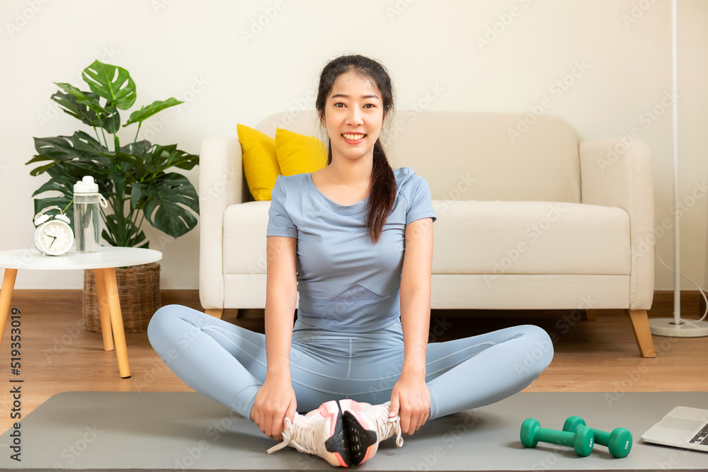 Healthy lifestyle young woman fitness gym for body slim. Young people girl exercise at living room on line. Fitness instructor exercising the fitness. Diet and Healthy sport Concept