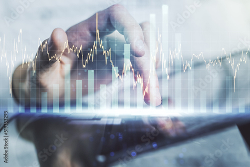 Принти на полотні Abstract creative financial graph with finger clicks on a digital tablet on background, financial and trading concept