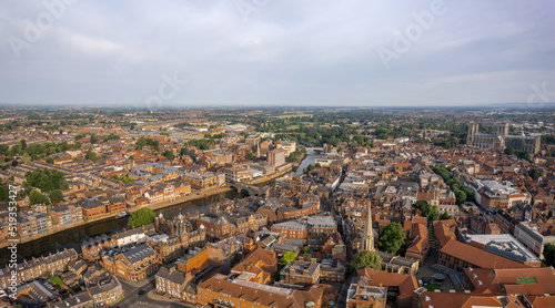 The drone aerial view of York, England. York is a cathedral city with Roman origins, sited at the confluence of the rivers Ouse and Foss in North Yorkshire, England.