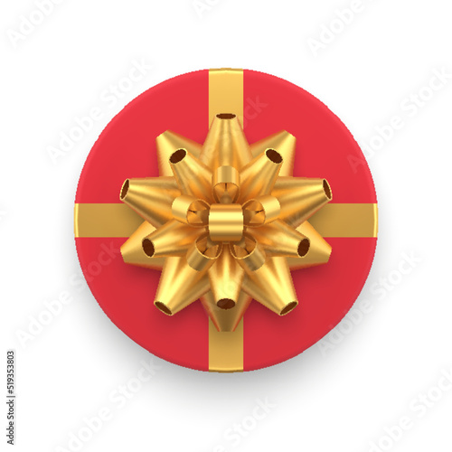 Rounded gift box package red wrap with glossy tied golden bow