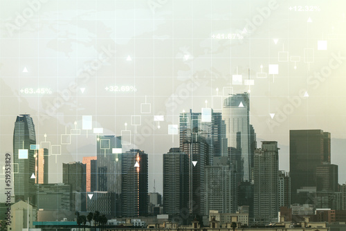 Multi exposure of virtual abstract financial graph hologram and world map on Los Angeles cityscape background  financial and trading concept