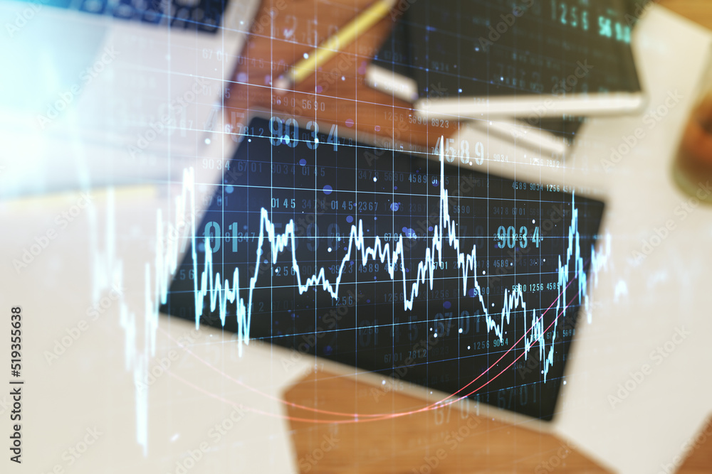 Multi exposure of abstract creative financial chart and digital tablet on background, top view, research and analytics concept Multi exposure of abstract creative financial chart and digital tablet on background, top view, research and analytics concept