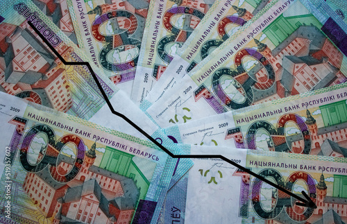 Background of one hundred Belarusian rubles with a graph of the fall . A hundred-ruble bill of the Republic of Belarus. National currency