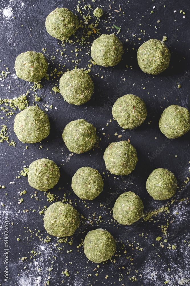 Ingredients to make falafel. Grounded chick peas. Green healthy food. Vegan delicious dish. Vegetarian meal. Food preparation. Arabic dish. Ingredients to make falafel. Grounded chick peas. Green healthy food. Vegan delicious dish. Vegetarian meal. Food preparation. Arabic dish.