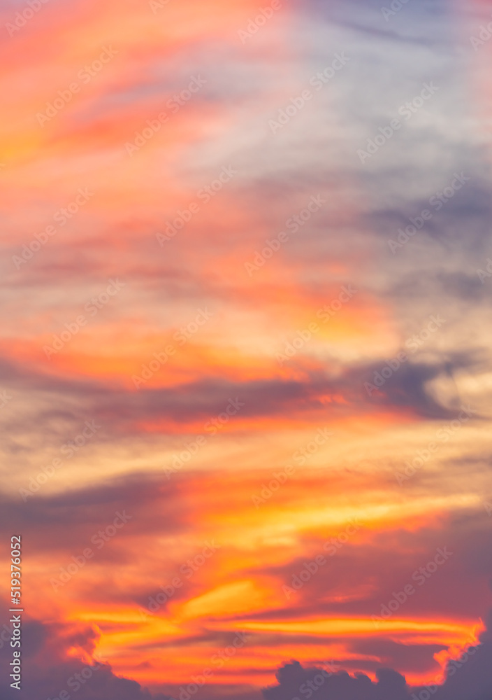 Sunset sky clouds vertical with colorful sunlight in the evening, Dusk sky background 