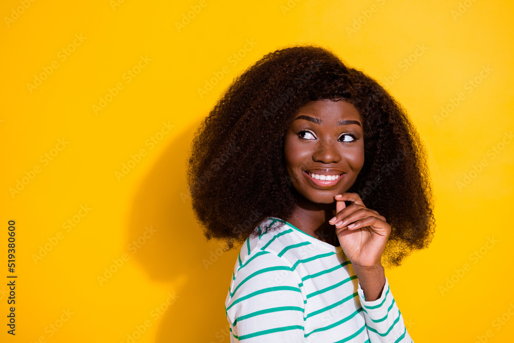 Profile photo of pretty cheerful lady hand touch chin look interested empty space isolated on yellow color background Profile photo of pretty cheerful lady hand touch chin look interested empty space isolated on yellow color background