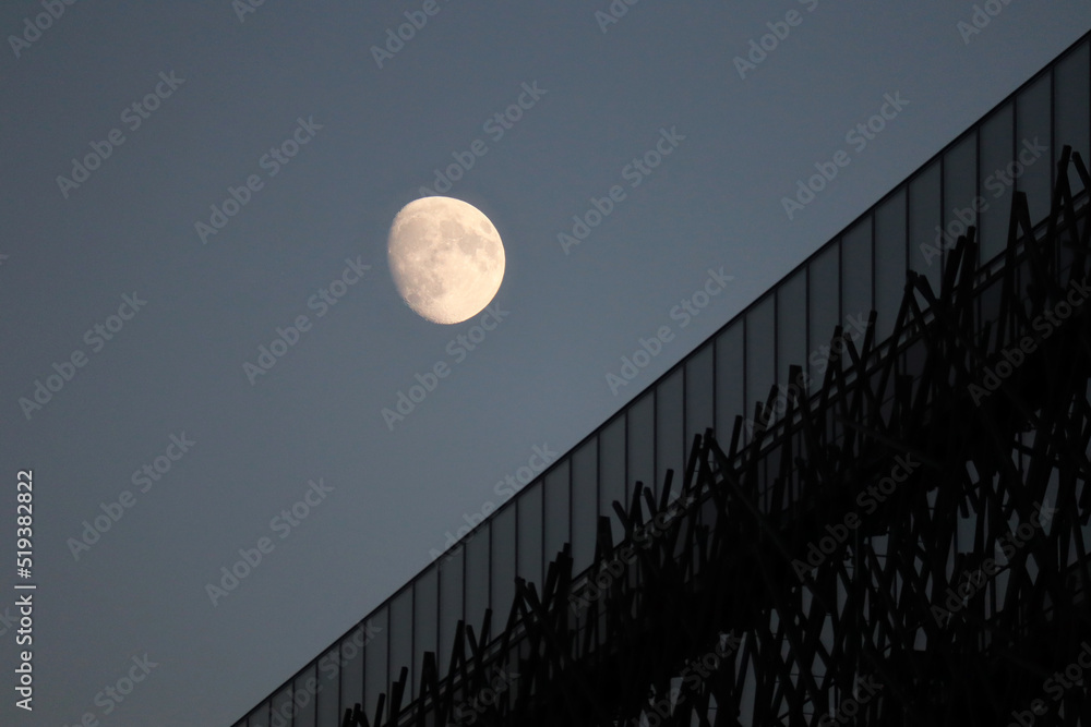 Bright moon over the building in the 13th arrondissement of Paris - obrazy, fototapety, plakaty 