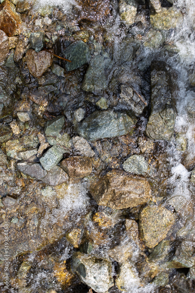 mountain river flows fast over rocks close-up mountain river flows fast over rocks close-up