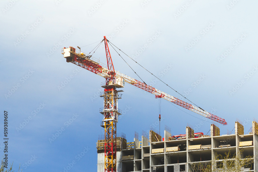Lifting crane. Construction of high structures. Rise to height.
