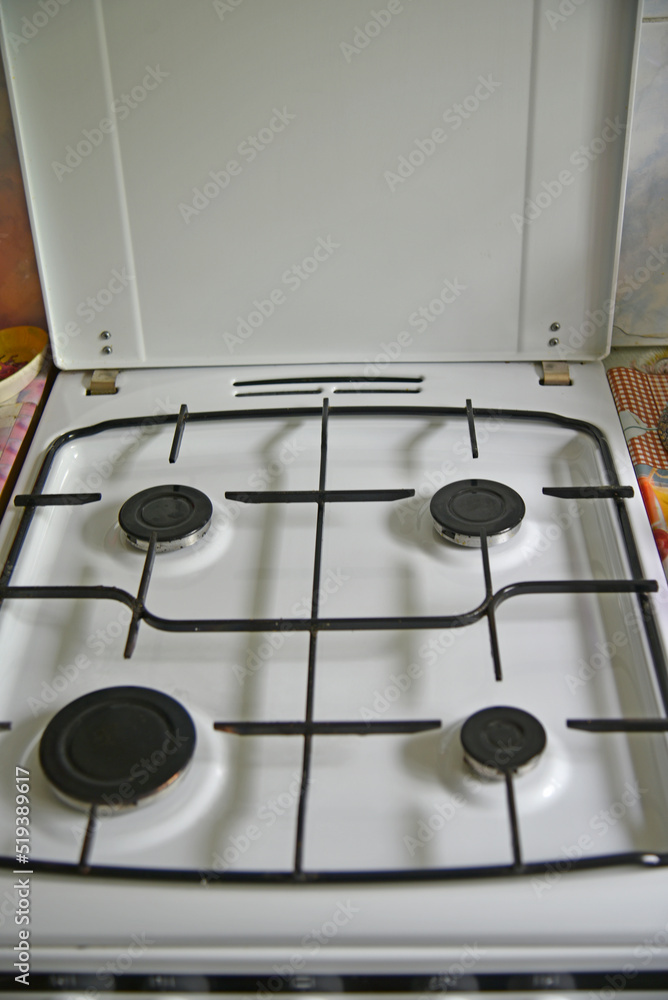 White kitchen gas stove during the day White kitchen gas stove during the day