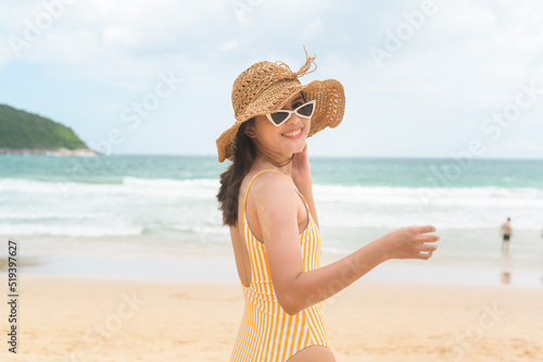 Young Beautiful woman in Bikini enjoying and relaxing on the beach,  Summer, vacation, holidays, Lifestyles concept.