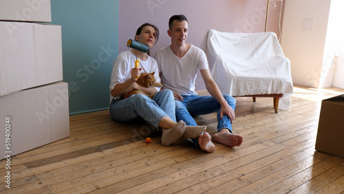 A young family moves into a beautiful apartment. The day of moving into a new house and planning the space.