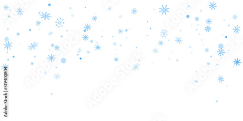 Blue delicate openwork snowflakes scatter on a white background. Festive background, postcard design, wallpaper