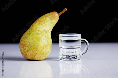 Obraz na płótnie Homemande Schnapps with pear fruit