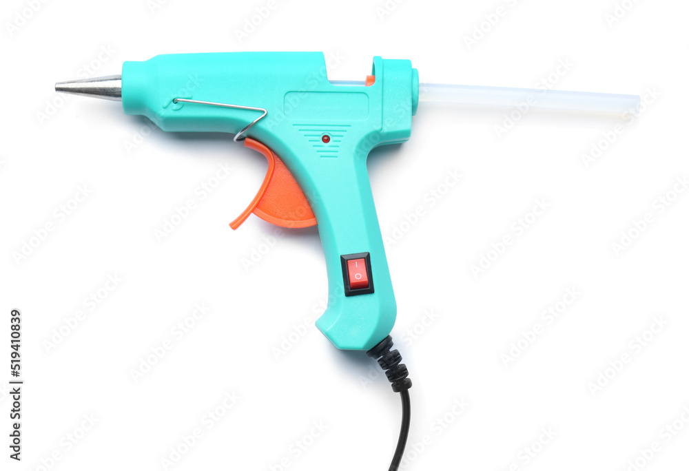 Turquoise glue gun with stick isolated on white, top view Turquoise glue gun with stick isolated on white, top view