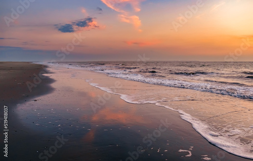colorful sunset on the beach, mud flat 
