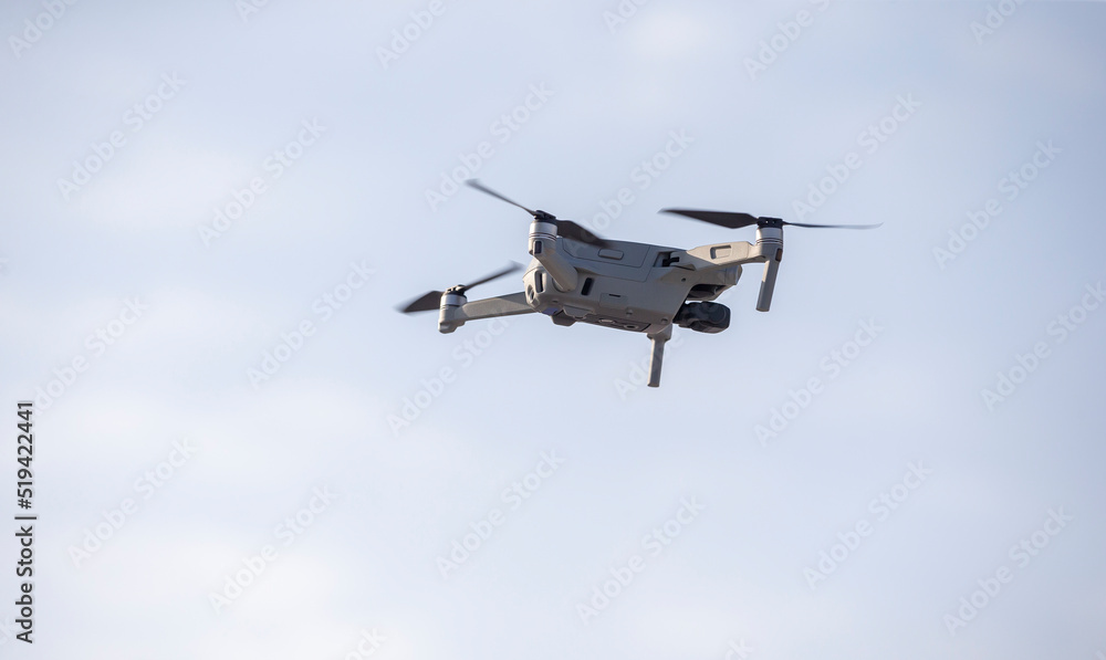 Drone landing, hovering in the sky