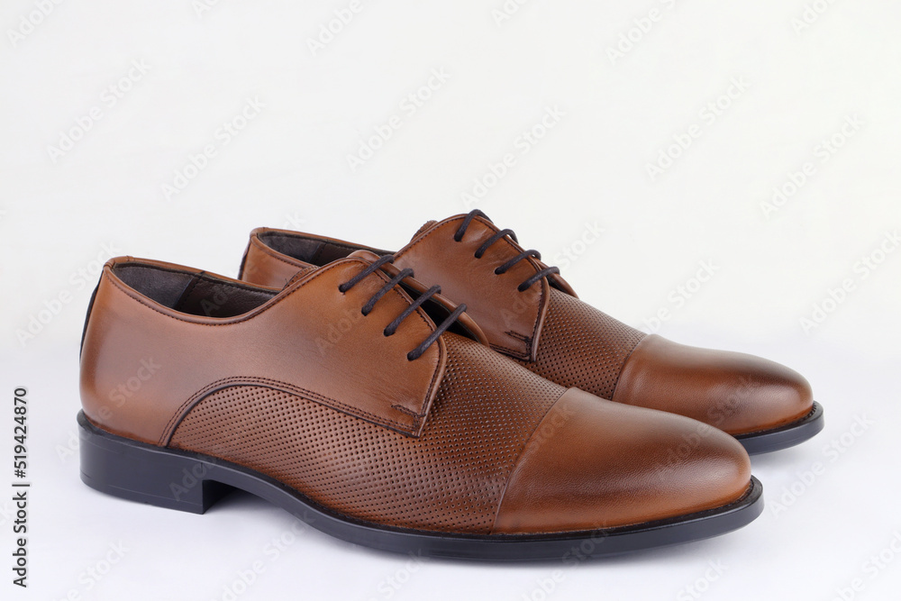Brown leather man shoes isolated on white background Brown leather man shoes isolated on white background