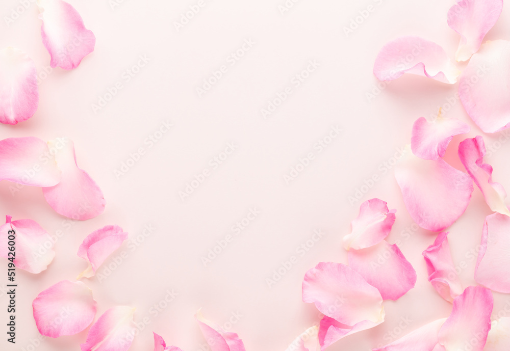 Rose flowers petals on pastel background. Valentines day background. Flat lay, top view, copy space.