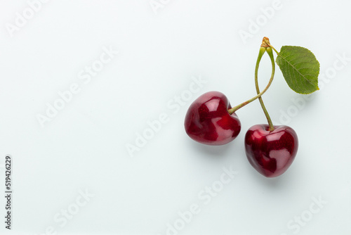 Canvastavla Cherry berries on a pastel background top view