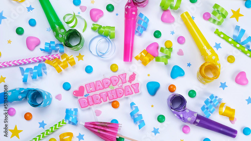  white background with candies, balloons and tubes for birthday or party celebration,concept for birthday,anniversary,congratulations