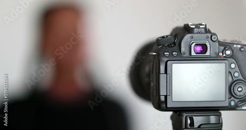 Black female vlogger speaking to camera. African mixed race girl talking to media channel