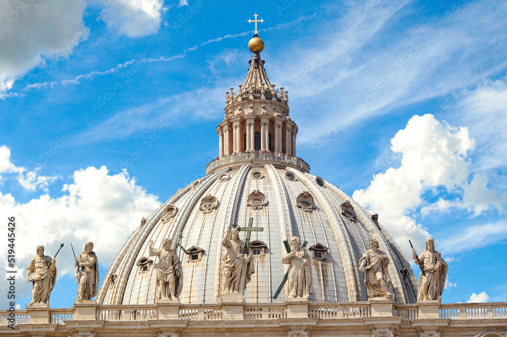 Top of St. Peter's Basilica Cathedral's roof with statues of Jesus carrying the cross, including St. Peter, St. Longinus, the Pieta, and more. 