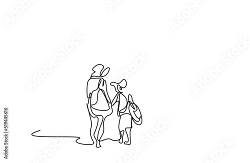 a mother and her son with a backpack walk to school together