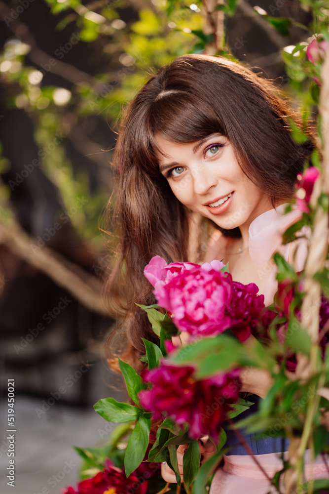 fabulous. a beautiful and gentle woman in peony flowers. feminine beauty. fabulous. a beautiful and gentle woman in peony flowers. feminine beauty.