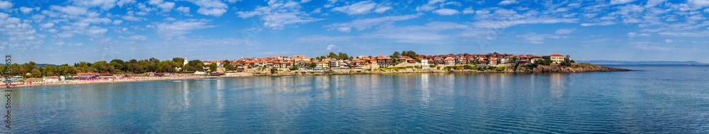 Seaside landscape, panorama, banner - view of the embankment with fortress wall and beach in the city of Sozopol on the Black Sea coast in Bulgaria