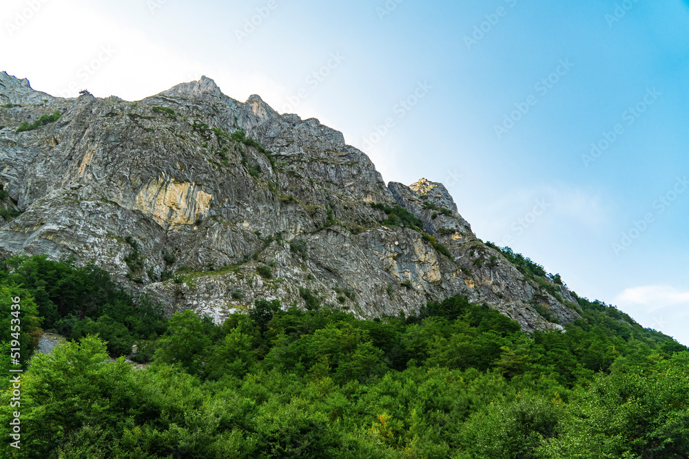 Montenegro. Prokletiye National Park. Summer. Mountain range. Green mountain peaks