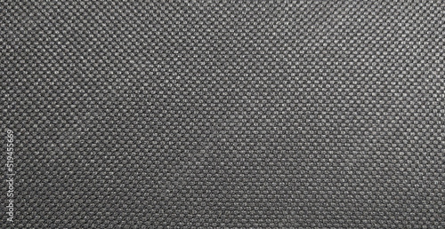 Black and white fabric. Close-up of gray factory textile.