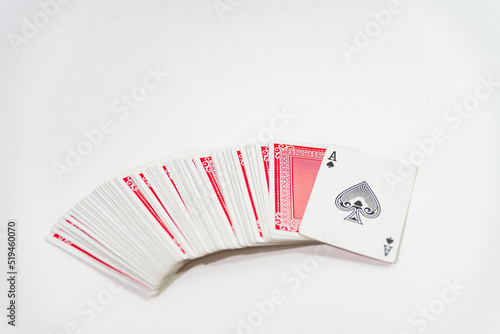 deck of cards face down on a white table