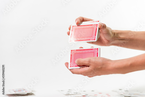 hand shuffling deck of cards to play