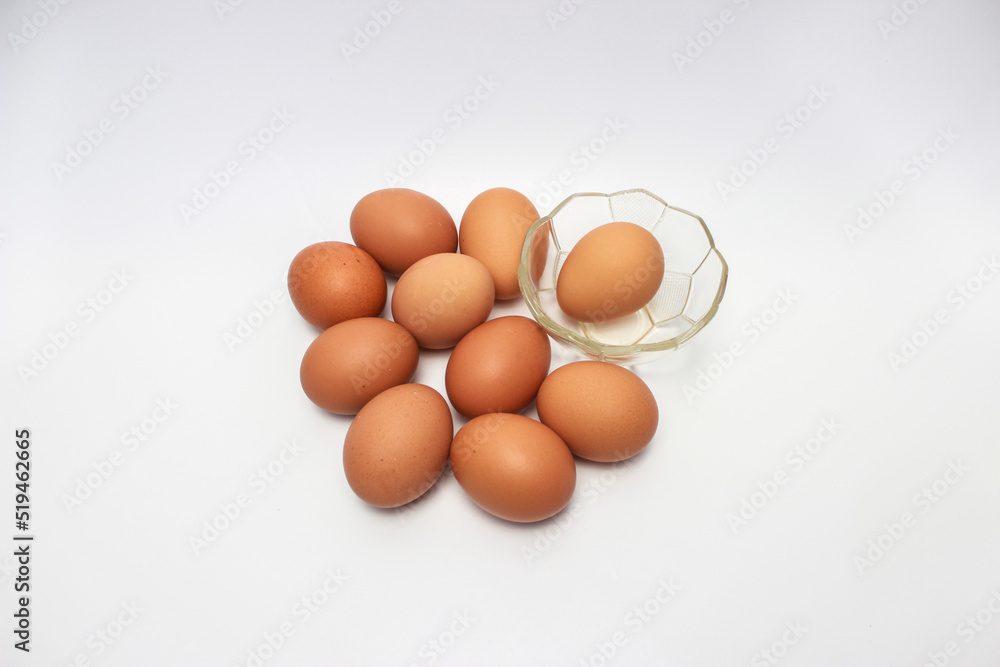 Close-Up of Fresh Raw Chicken Eggs on a White Background Close-Up of Fresh Raw Chicken Eggs on a White Background