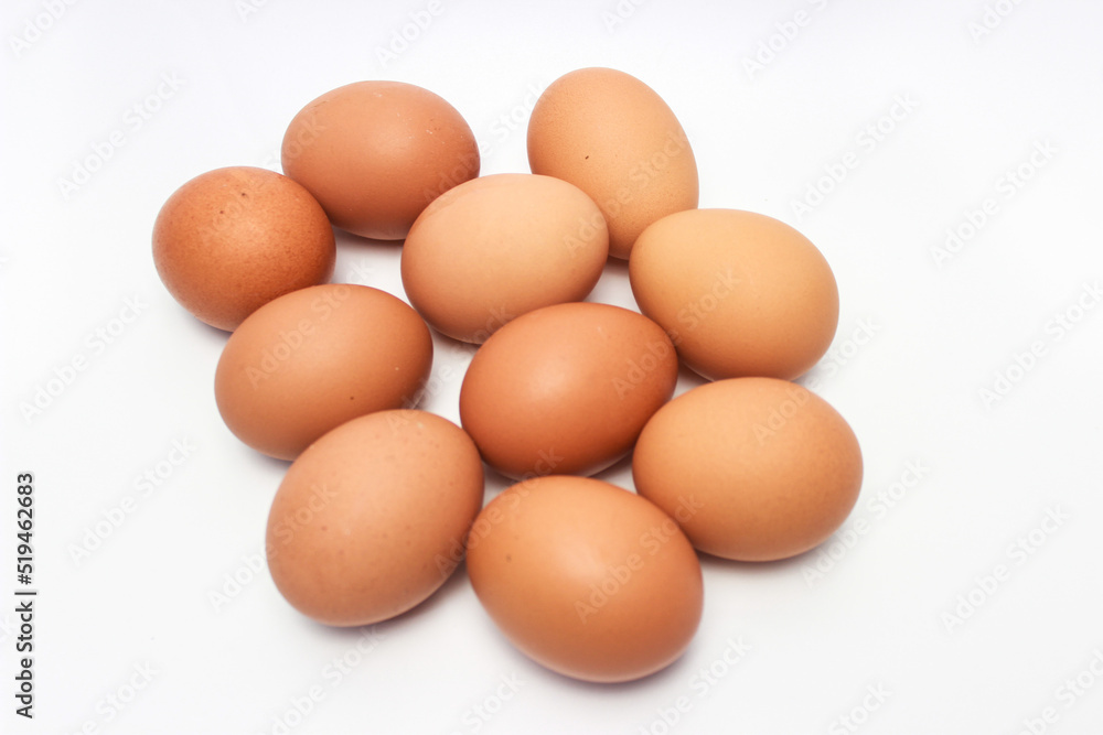 Close-Up of Fresh Raw Chicken Eggs on a White Background Close-Up of Fresh Raw Chicken Eggs on a White Background